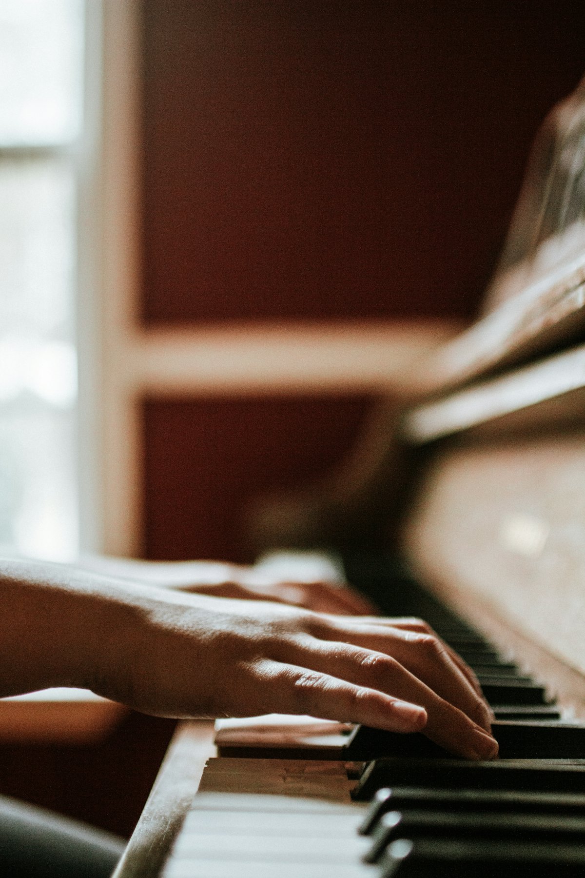 Pianist playing a grand piano